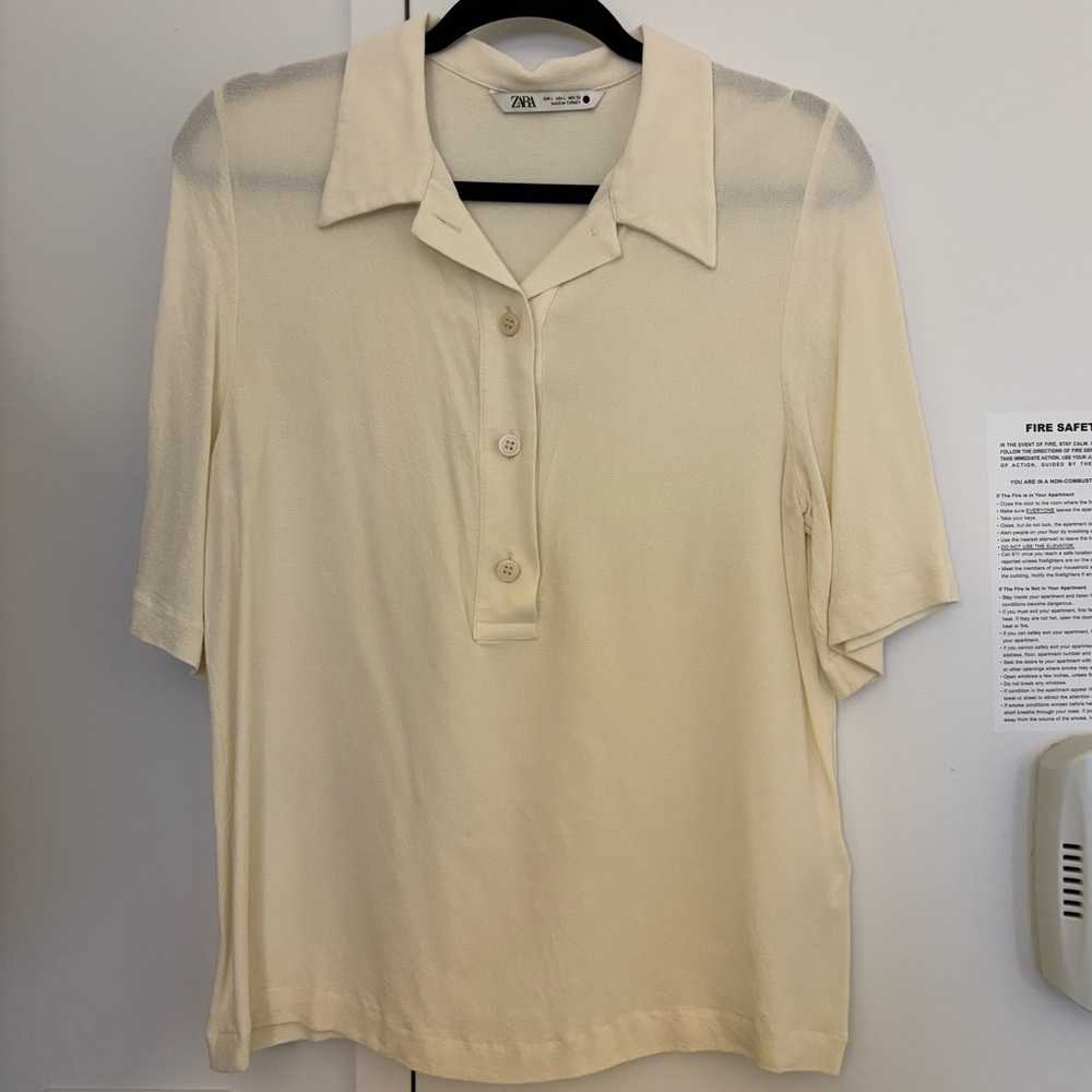 Short sleeve button down sheer blouse